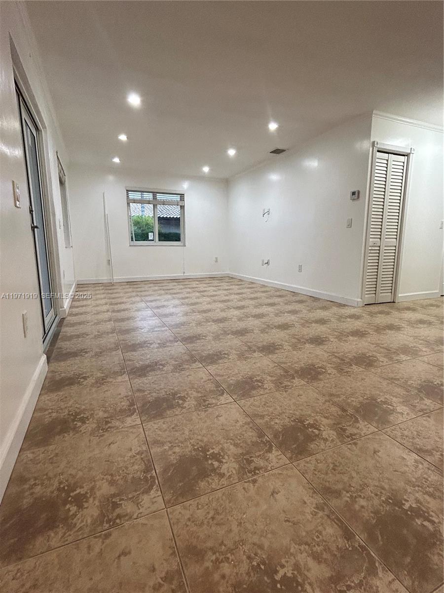 230 Southwest 30th Avenue, Unit 230 Miami, FL 33135 - Photo 6 of 22 a view of an empty room