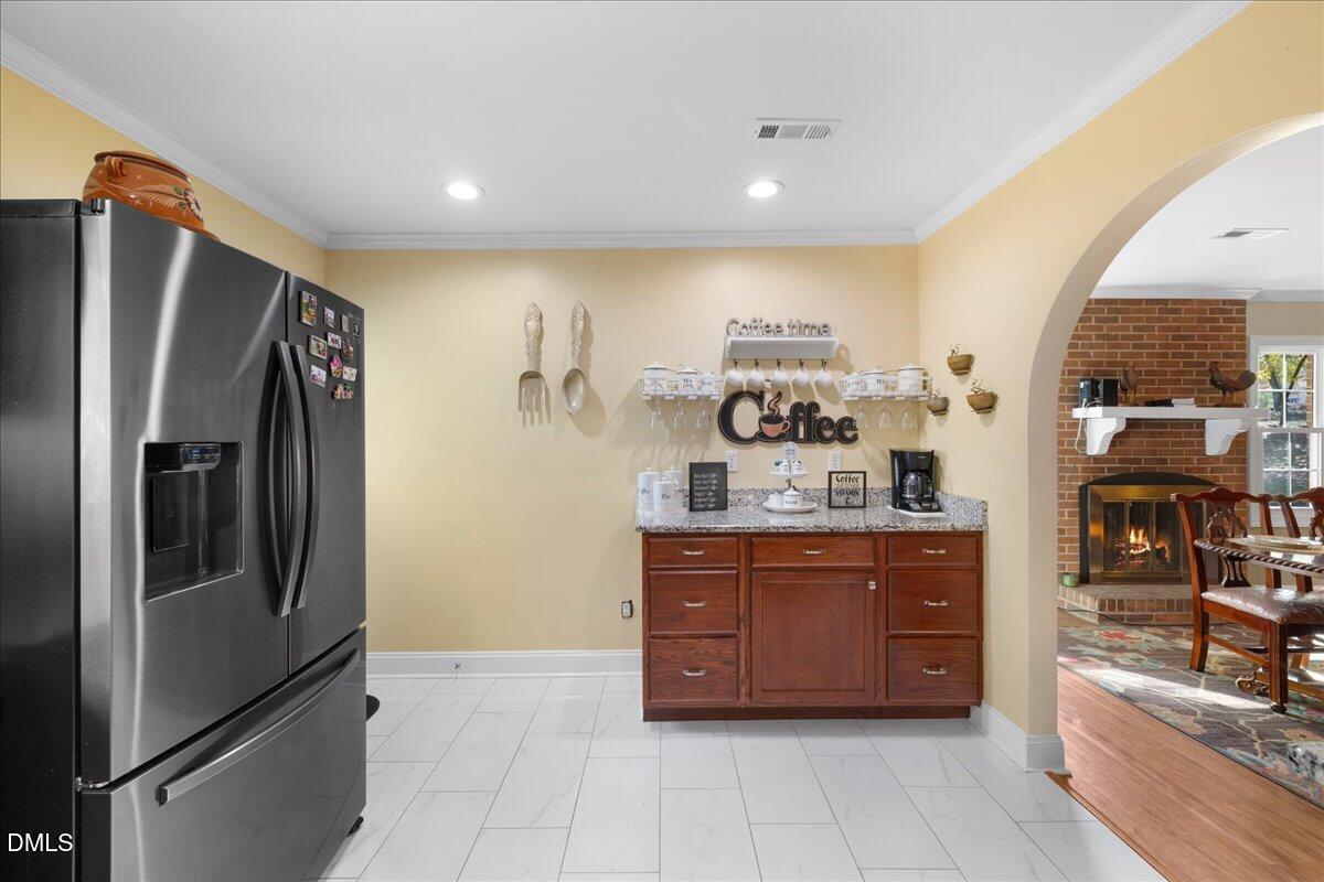 2323 Buckingham Road Burlington, NC 27217 - Photo 16 of 33 a kitchen with stainless steel appliances granite countertop a refrigerator and a sink