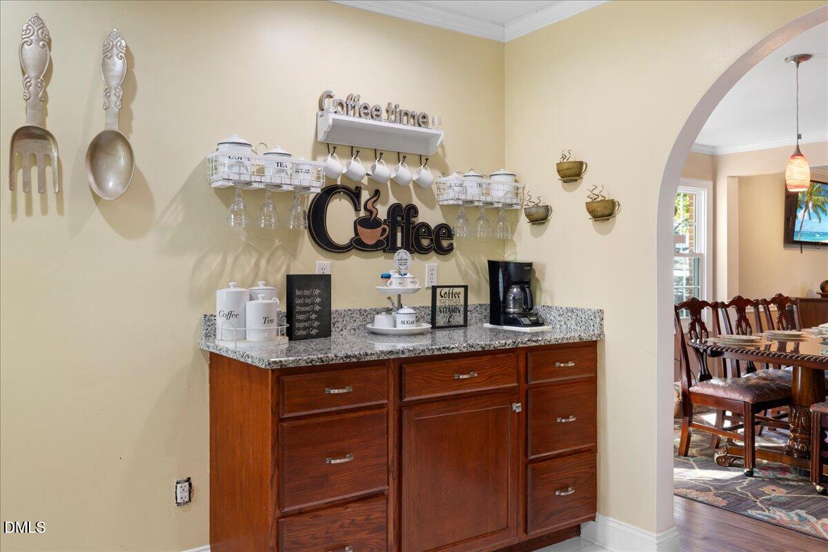 2323 Buckingham Road Burlington, NC 27217 - Photo 17 of 33 a room with cabinets and chair