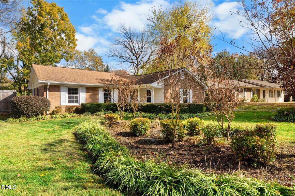 2323 Buckingham Road Burlington, NC 27217 - Photo 3 of 33 a front view of a house with a yard