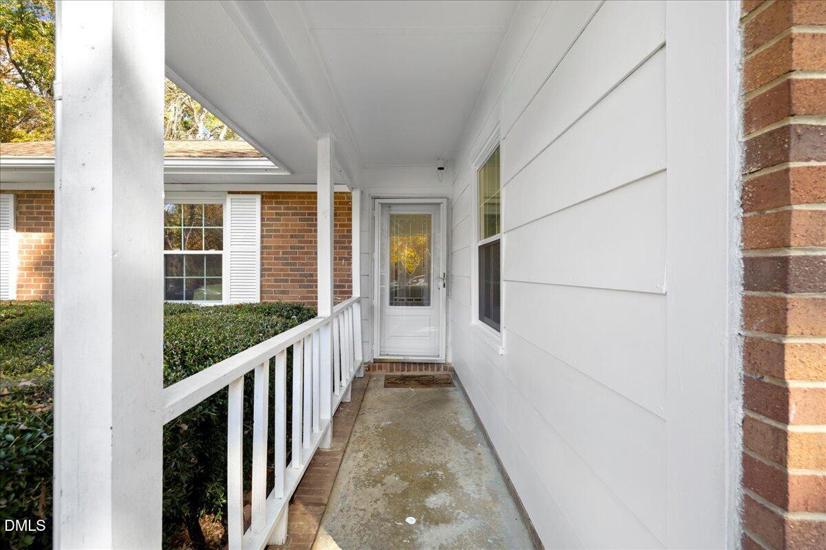 2323 Buckingham Road Burlington, NC 27217 - Photo 4 of 33 a view of a house with a porch