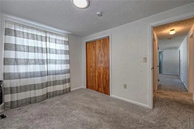 a view of hallway with natural light