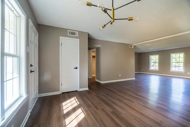 a view of livingroom with hardwood floor and window