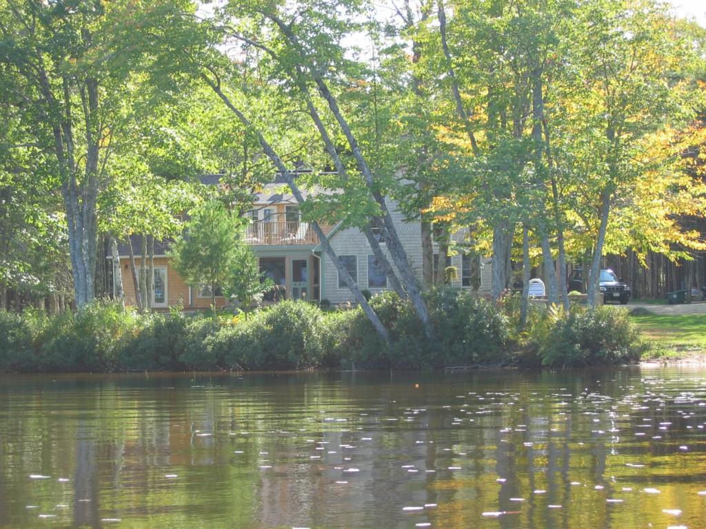 233 Gus Moore Road Penobscot, ME 04476 - Photo 22 of 35 View of the cottage from the water.