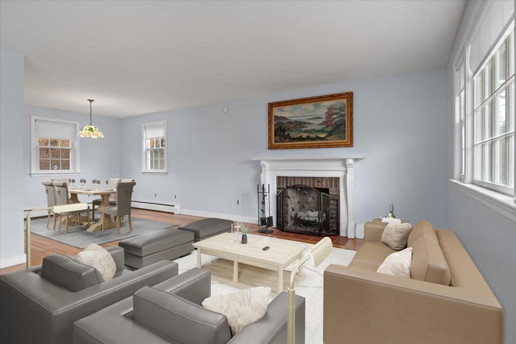 124 Turtle Pond Parkway Boston, MA 02136 - Photo 15 of 39 a living room with furniture a fireplace and a flat screen tv