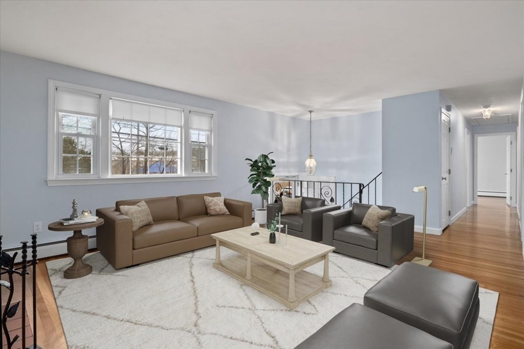 124 Turtle Pond Parkway Boston, MA 02136 - Photo 16 of 39 a living room with furniture and a large window