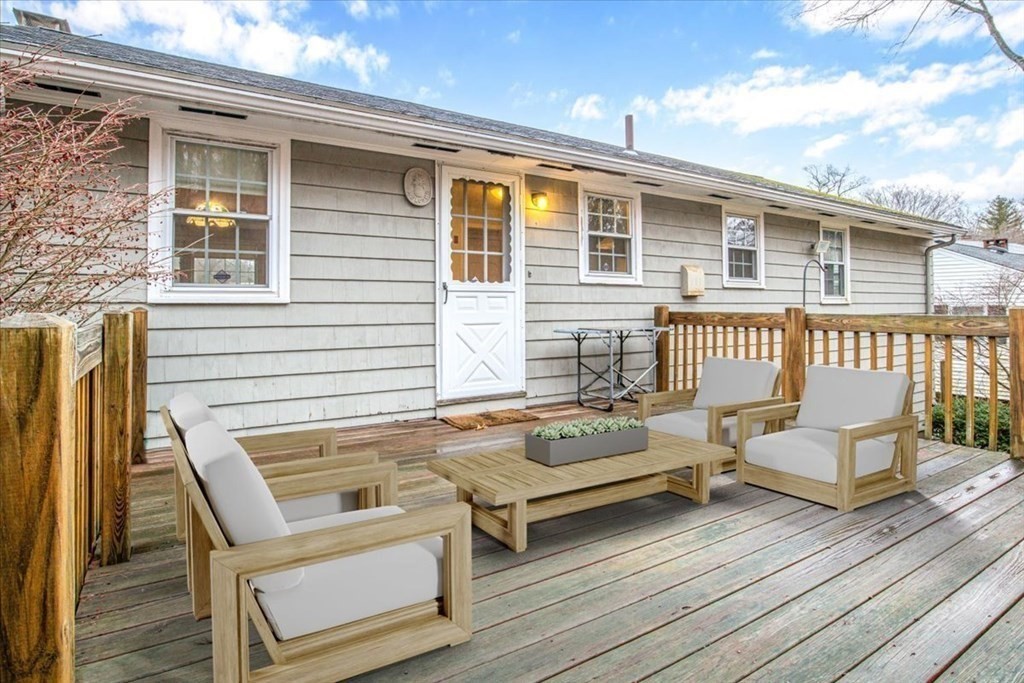 124 Turtle Pond Parkway Boston, MA 02136 - Photo 31 of 39 a view of a two chairs in the deck