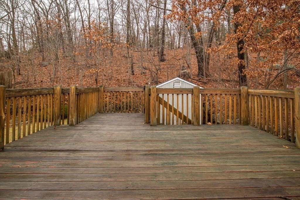 124 Turtle Pond Parkway Boston, MA 02136 - Photo 33 of 39 a view of a wooden deck