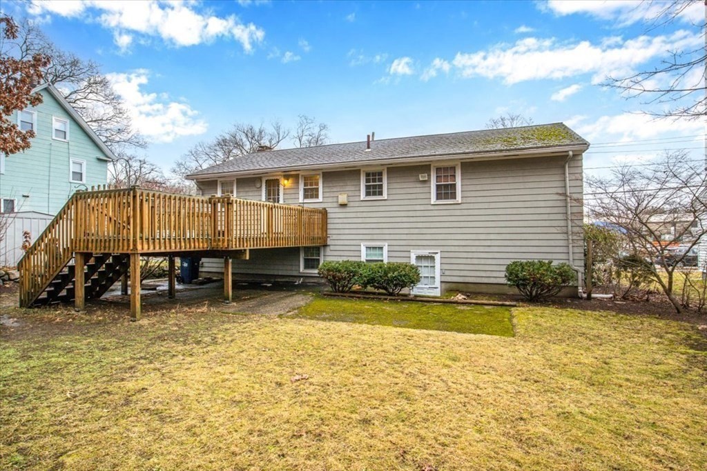 124 Turtle Pond Parkway Boston, MA 02136 - Photo 34 of 39 a view of a house with a yard and sitting area