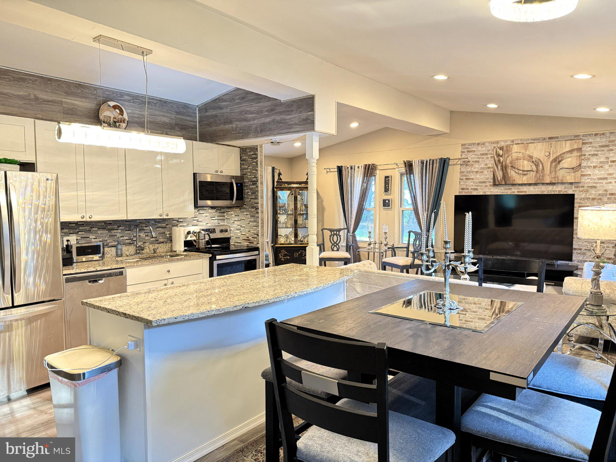 7340 Damascus Road Gaithersburg, MD 20882 - Photo 14 of 35 Modern open-concept living space.