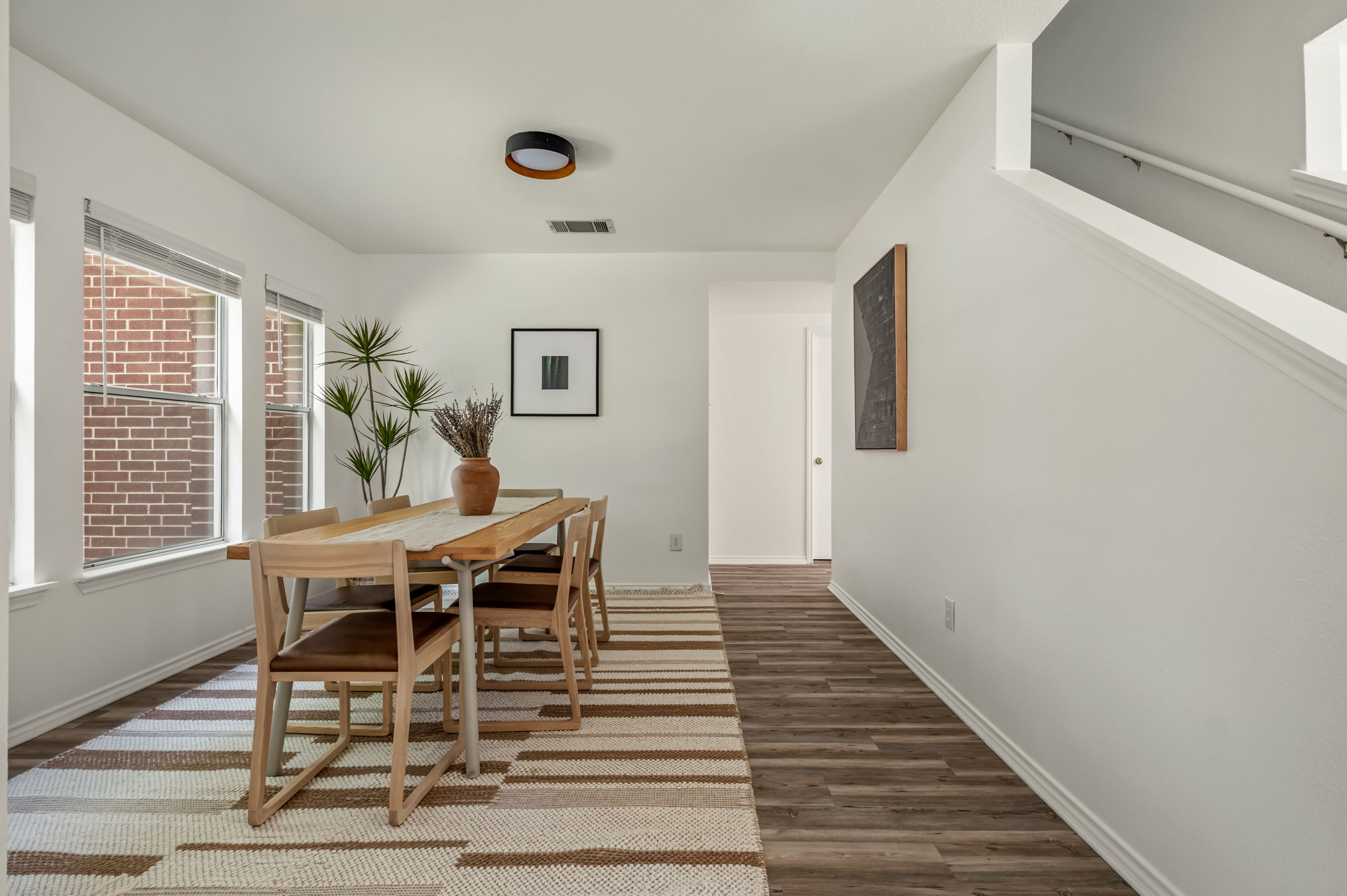 1408 Water Spaniel Way Round Rock, TX 78664 - Photo 17 of 37 This naturally illuminated dining space offers an open layout with rich wood flooring.