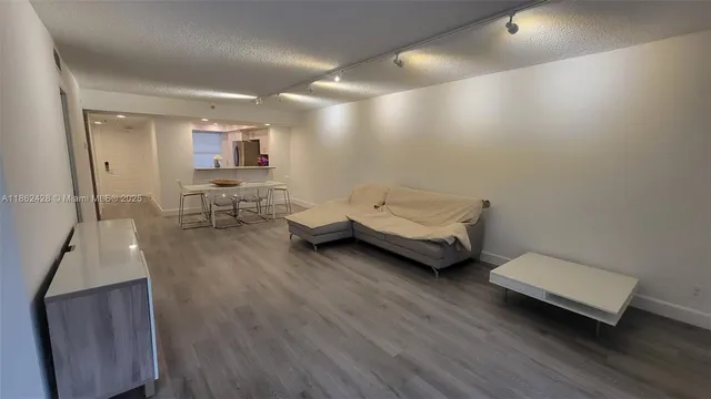 a view of storage and utility room with washer and dryer