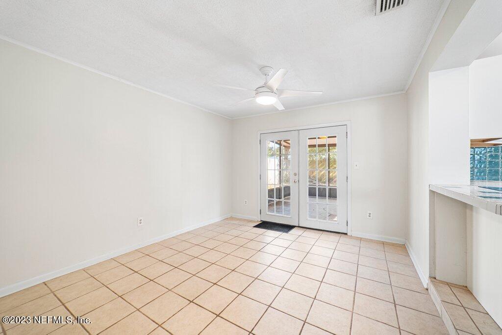 6147 Temple Road Jacksonville, FL 32217 - Photo 17 of 36 a view of an empty room with a window