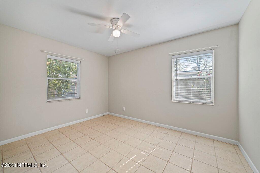 6147 Temple Road Jacksonville, FL 32217 - Photo 24 of 36 an empty room with windows