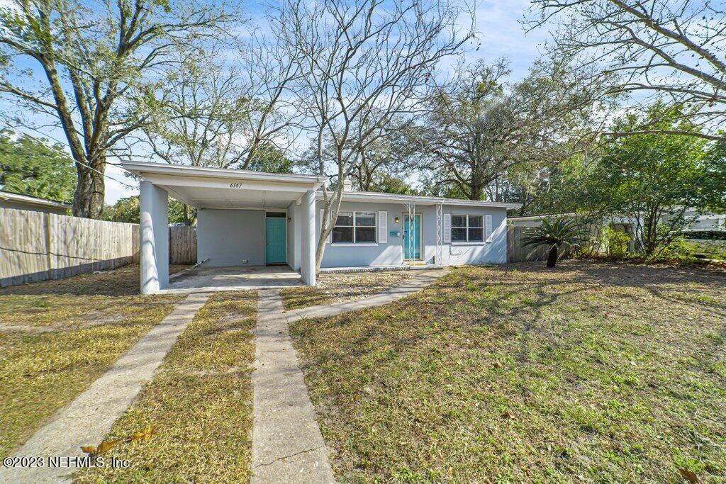 6147 Temple Road Jacksonville, FL 32217 - Photo 3 of 36 front view of a house with a yard
