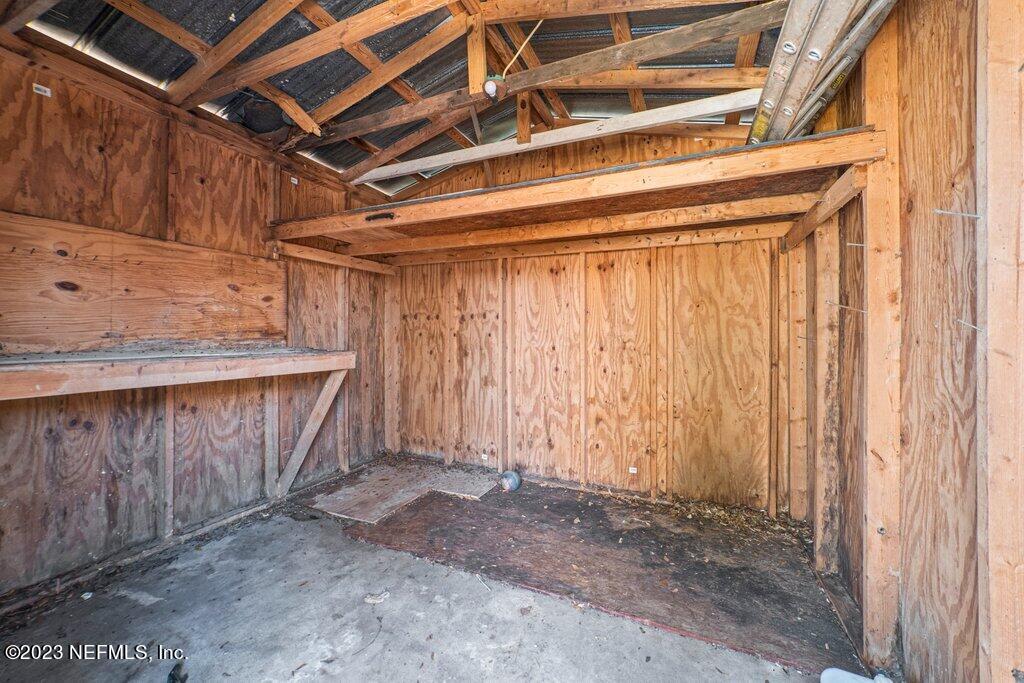 6147 Temple Road Jacksonville, FL 32217 - Photo 35 of 36 a view of a room with wooden walls
