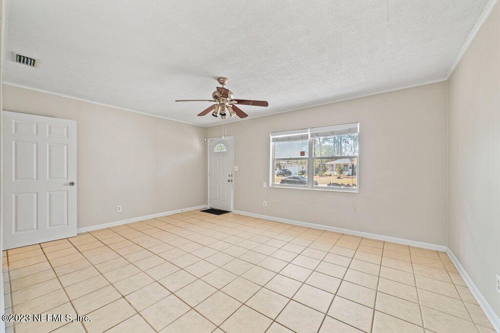 6147 Temple Road Jacksonville, FL 32217 - Photo 7 of 36 a view of an empty room and window