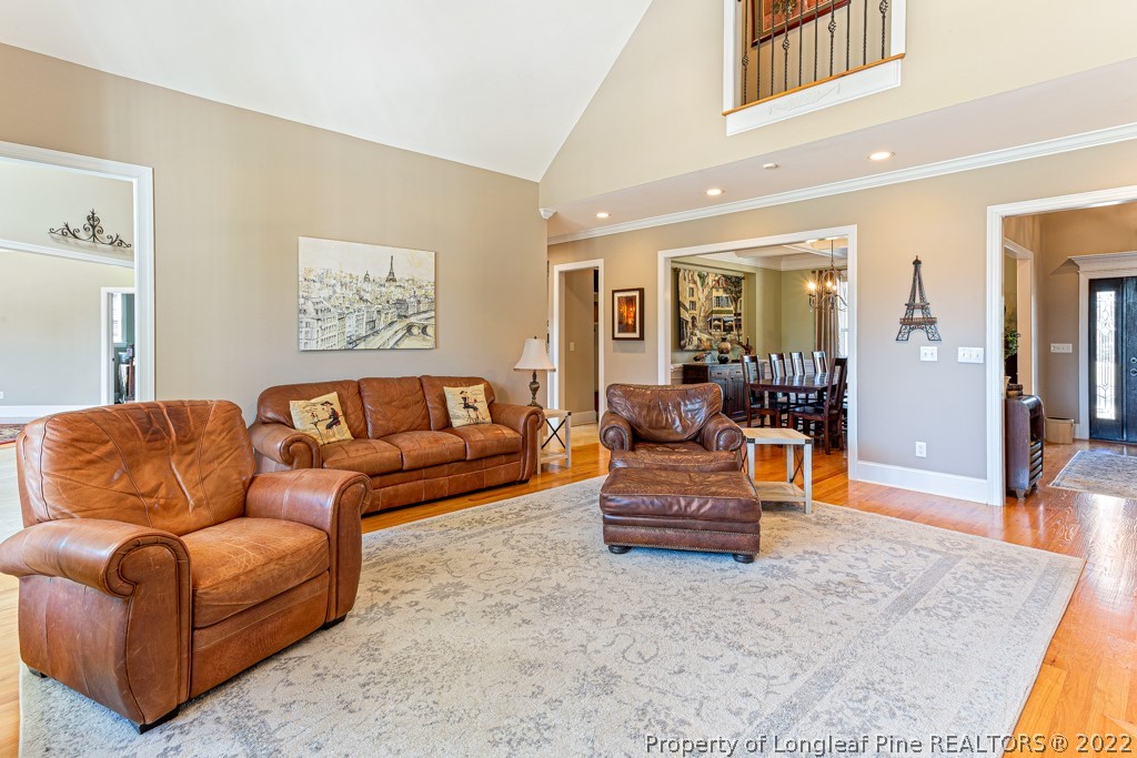 375 East Lake Ridge Road Raeford, NC 28376 - Photo 15 of 50 a living room with furniture and wooden floor