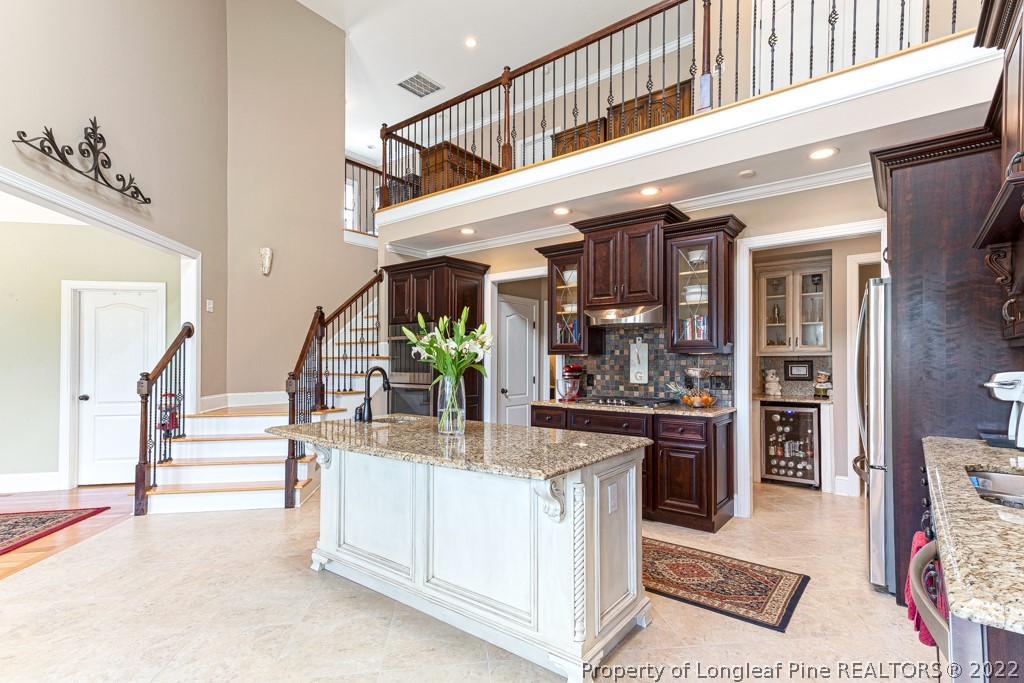 375 East Lake Ridge Road Raeford, NC 28376 - Photo 23 of 50 a view of living room kitchen and front door