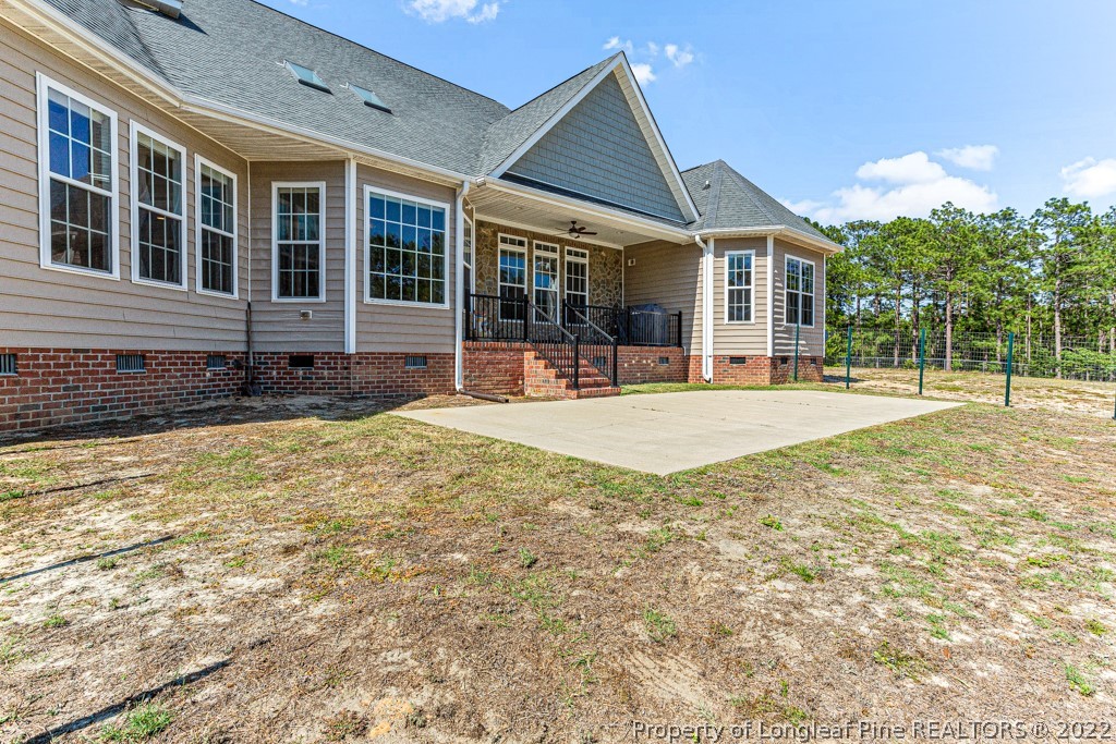 375 East Lake Ridge Road Raeford, NC 28376 - Photo 41 of 50 front view of a house with a patio