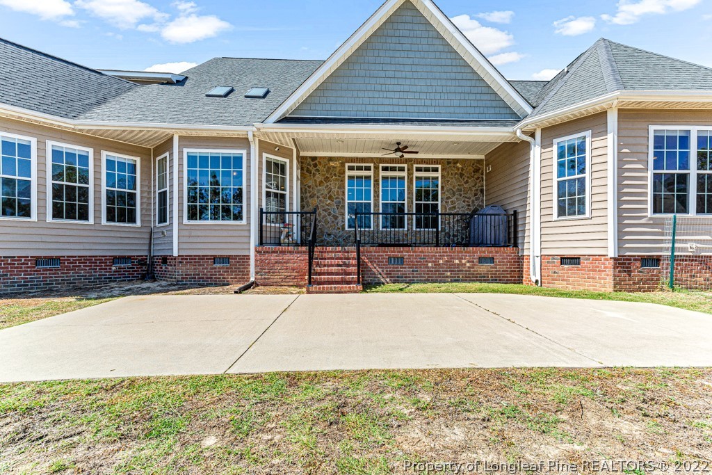 375 East Lake Ridge Road Raeford, NC 28376 - Photo 42 of 50 front view of a house with a yard