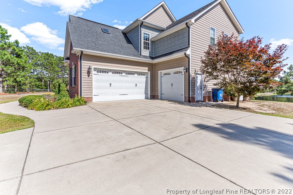 375 East Lake Ridge Road Raeford, NC 28376 - Photo 46 of 50 a view of a house with a street