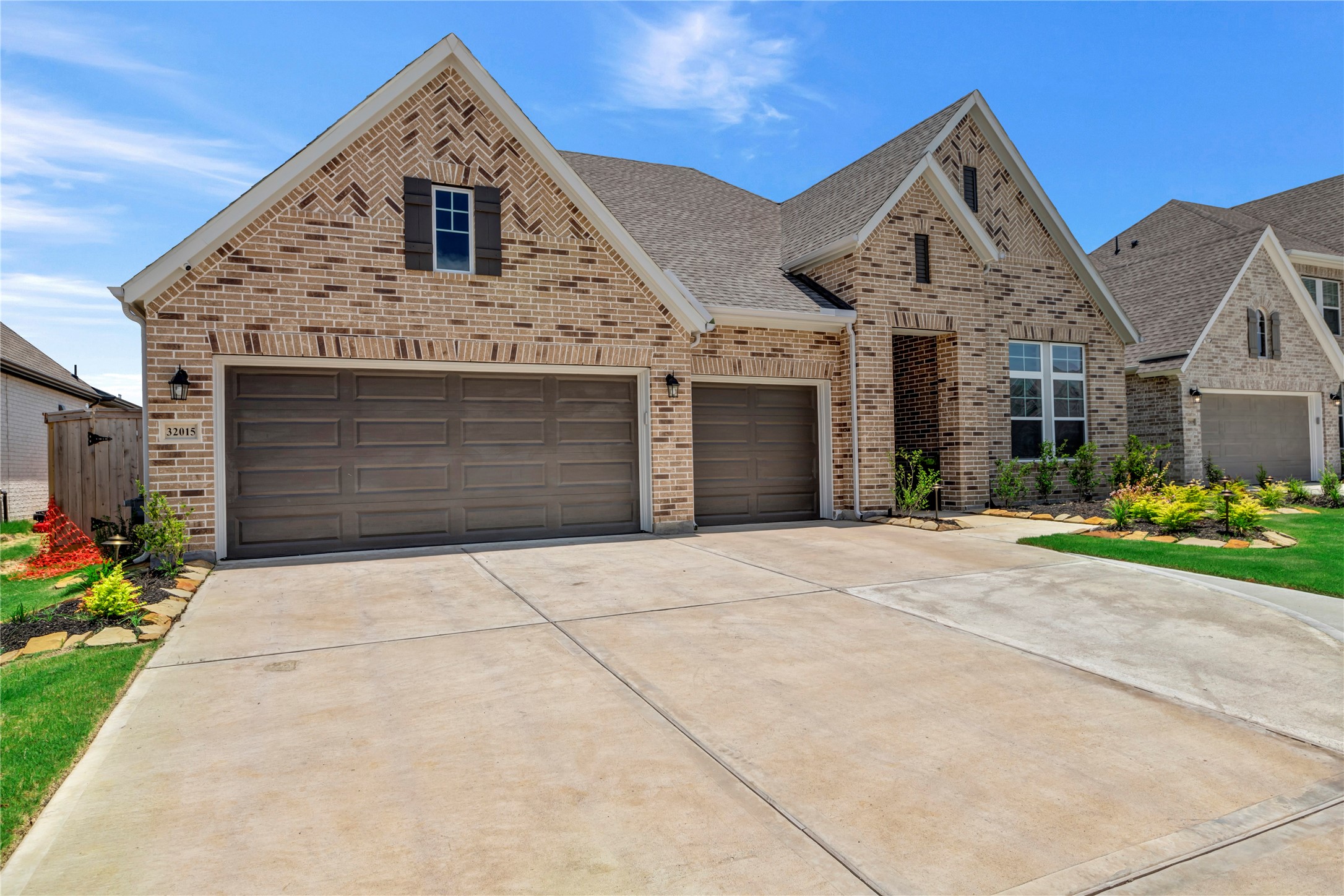 32015 River Birch Lane Waller, TX 77484 - Photo 2 of 31 a front view of a house with a garden