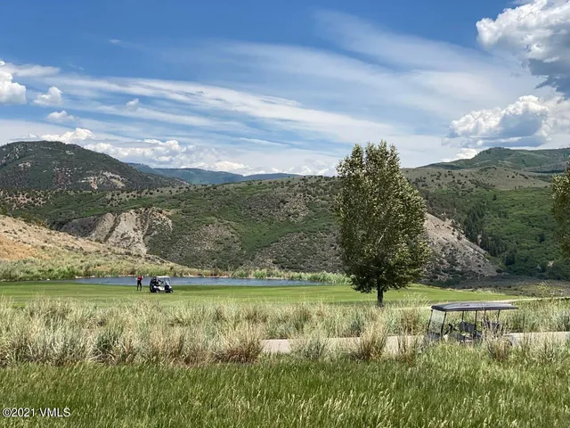 a view of a lake with a mountain in the background