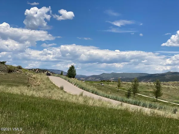 a view of an ocean and a building