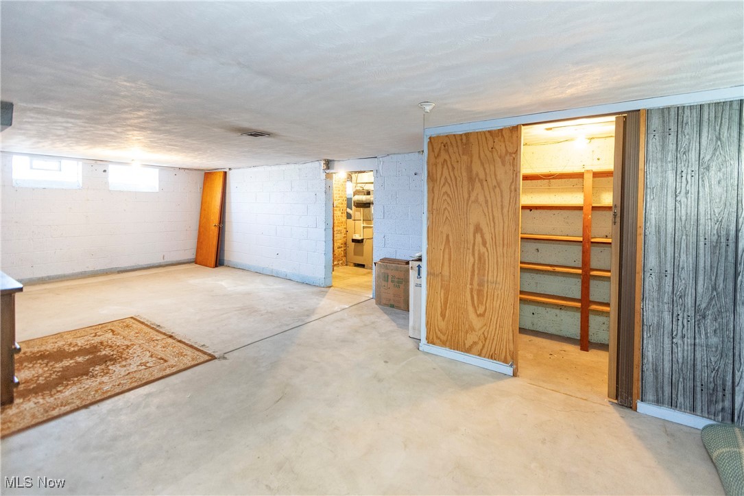 6168 Manchester Road Parma, OH 44129 - Photo 20 of 25 Basement recreation space ready for personal touches and a new life