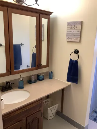 a bathroom with a toilet and a sink