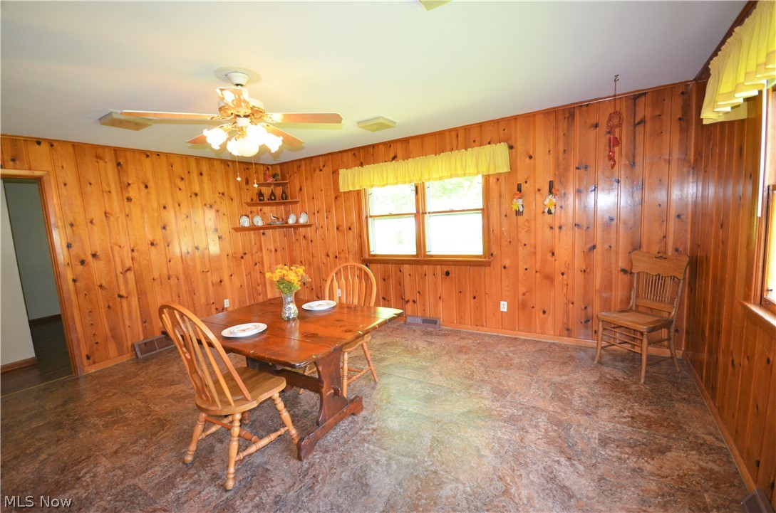 11902 West Lake Road Vermilion, OH 44089 - Photo 14 of 30 DINING ROOM IS SO LARGE COULD BE MADE INTO 2 ROOMS. NEW FLOORING IN DINING AND KITCHEN AREA