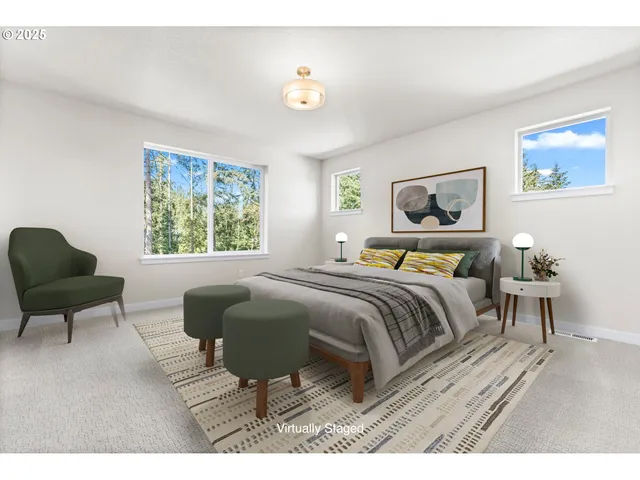 a bedroom with a bed and a chair