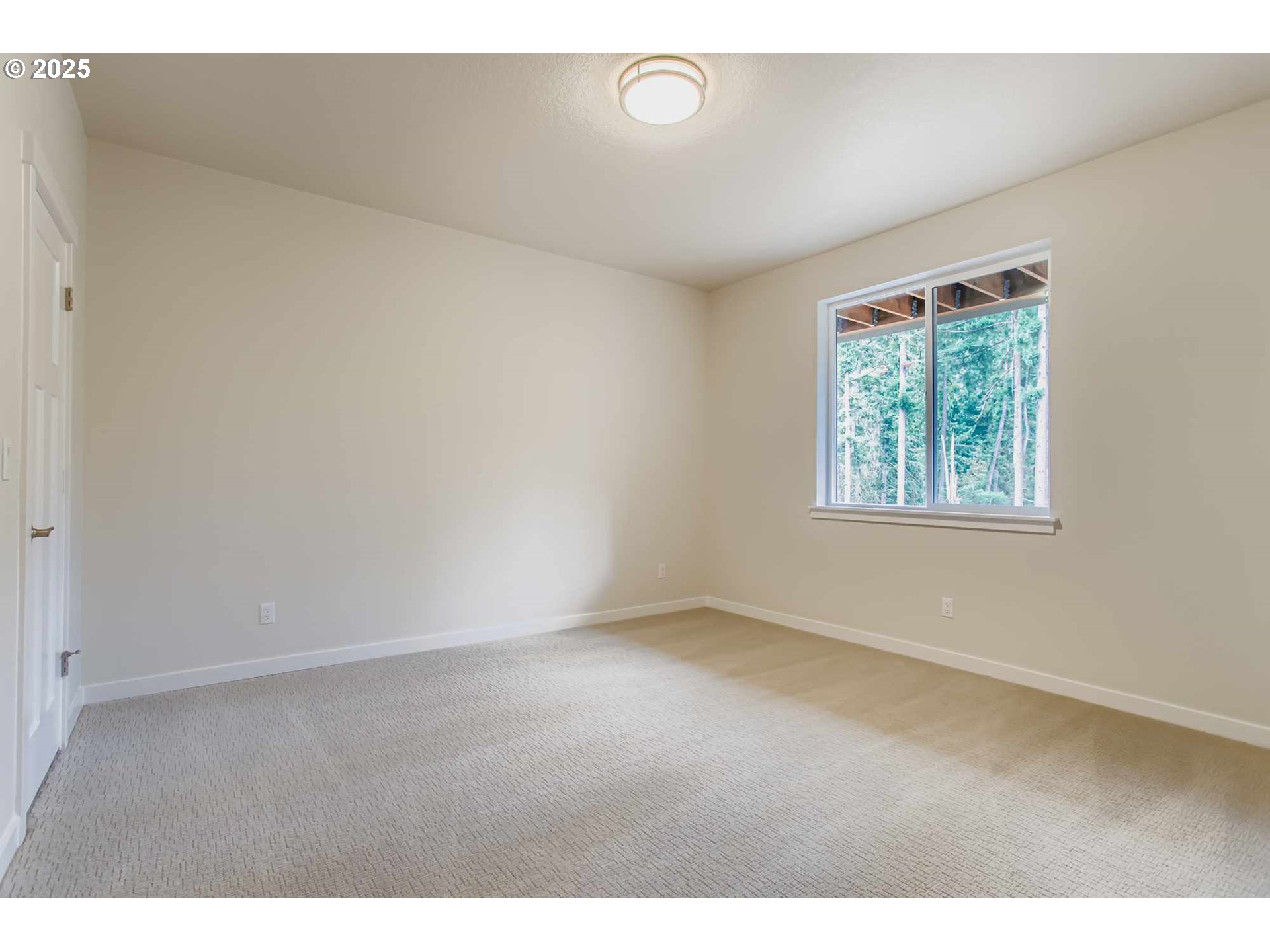 7827 Southwest Thornbridge Terrace Beaverton, OR 97007 - Photo 47 of 47 an empty room with windows