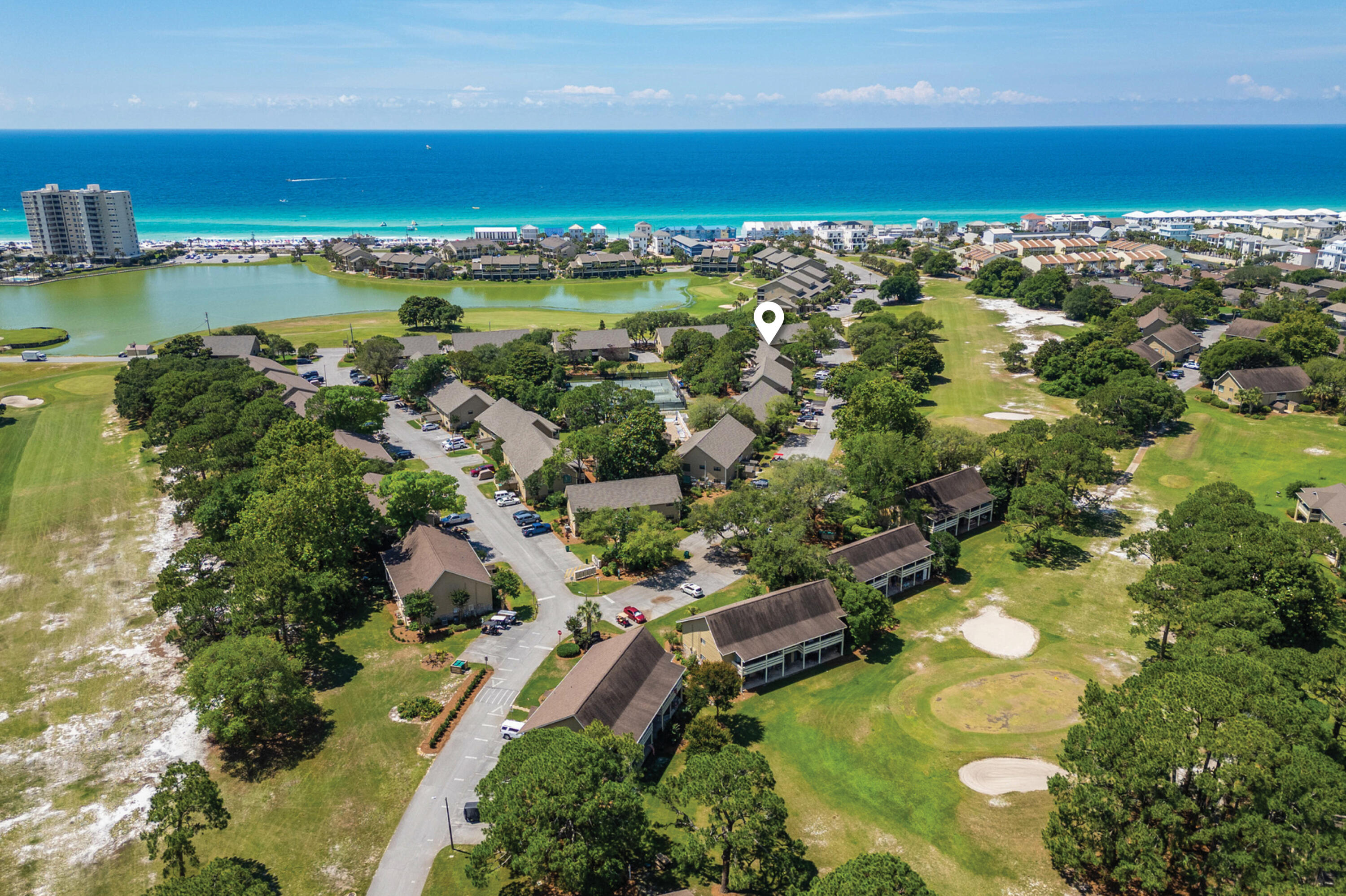 56 Sunset Bay, Unit 17B Miramar Beach, FL 32550 - Photo 25 of 30 an aerial view of ocean residential houses with outdoor space and swimming pool