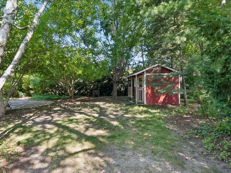1323 Auburn Avenue Naperville, IL 60565 - Photo 15 of 16 a backyard of a house with table and chairs