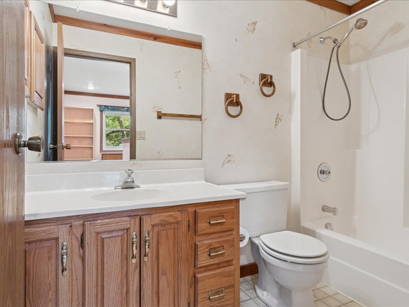 1323 Auburn Avenue Naperville, IL 60565 - Photo 10 of 16 a bathroom with a granite countertop sink toilet and shower