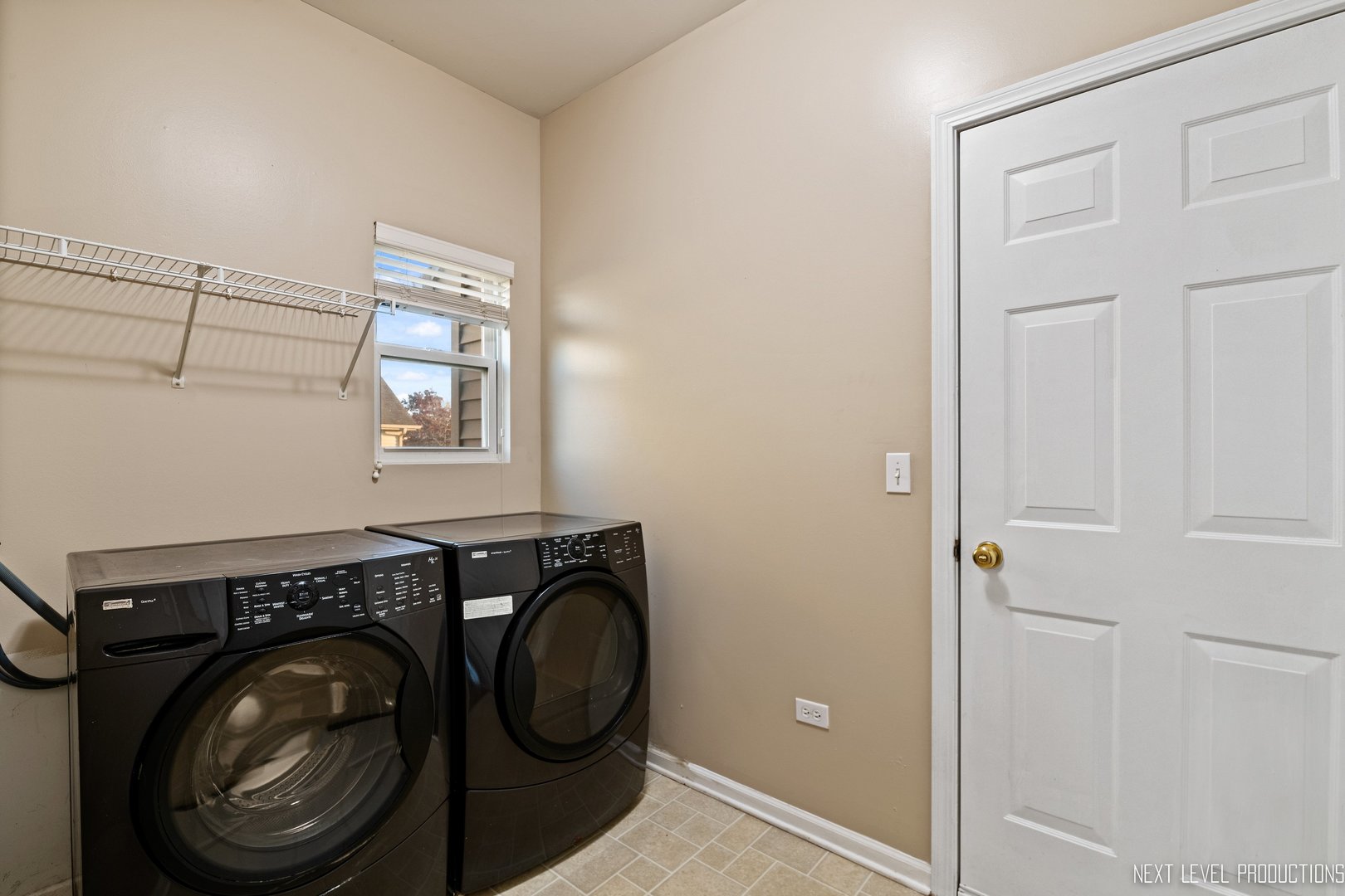 230 Tiger Street Bolingbrook, IL 60490 - Photo 16 of 27 a utility room with dryer and washer
