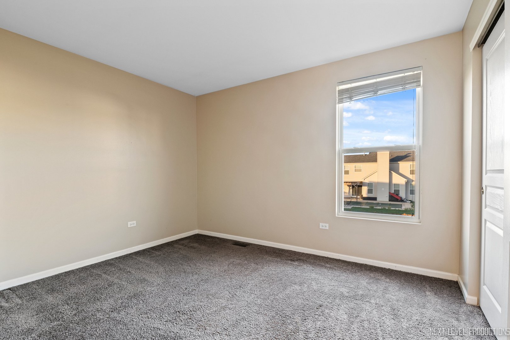 230 Tiger Street Bolingbrook, IL 60490 - Photo 20 of 27 an empty room with a window