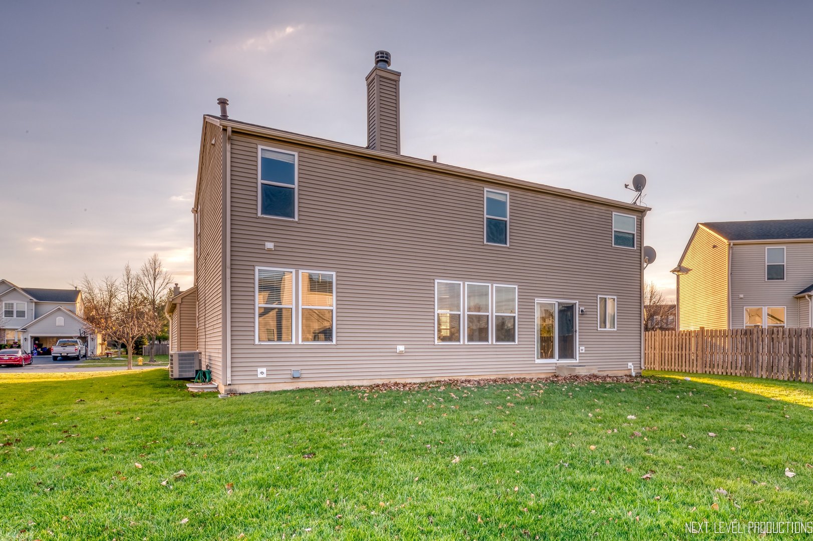 230 Tiger Street Bolingbrook, IL 60490 - Photo 26 of 27 a front view of a house with garden