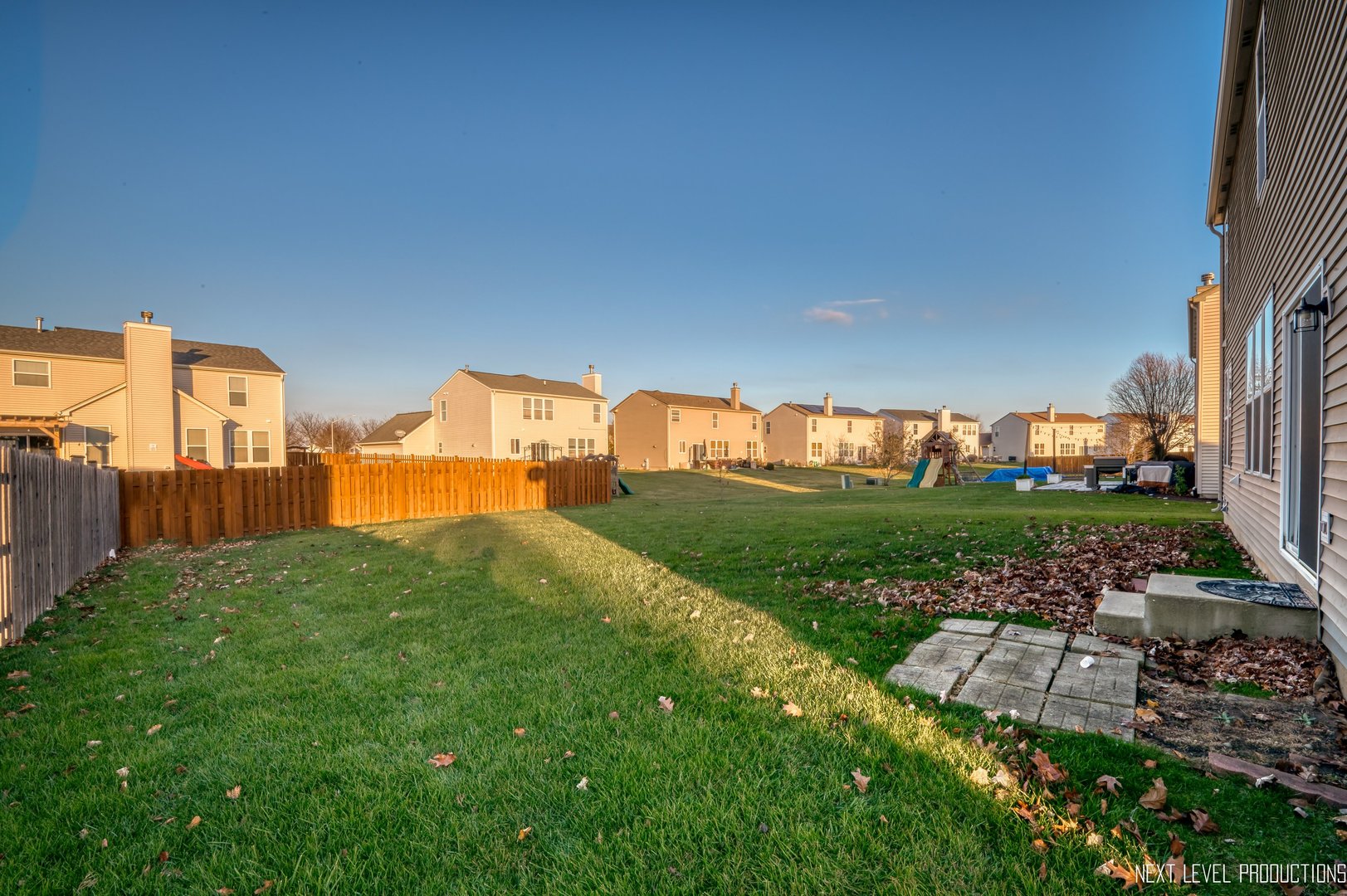 230 Tiger Street Bolingbrook, IL 60490 - Photo 27 of 27 a view of a city from a garden