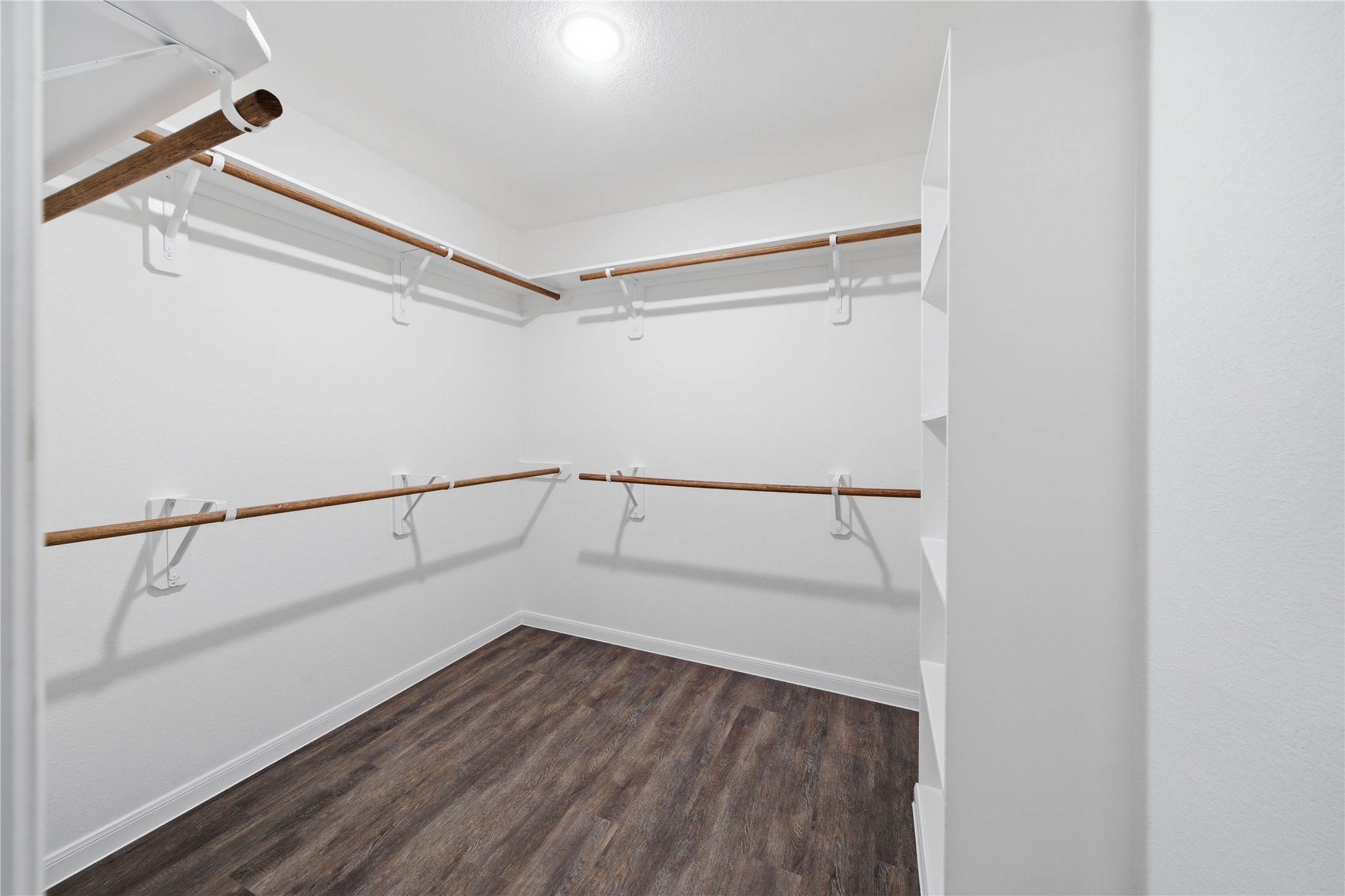 6623 County Road 4 Damon, TX 77430 - Photo 25 of 48 a view of an empty walk in closet