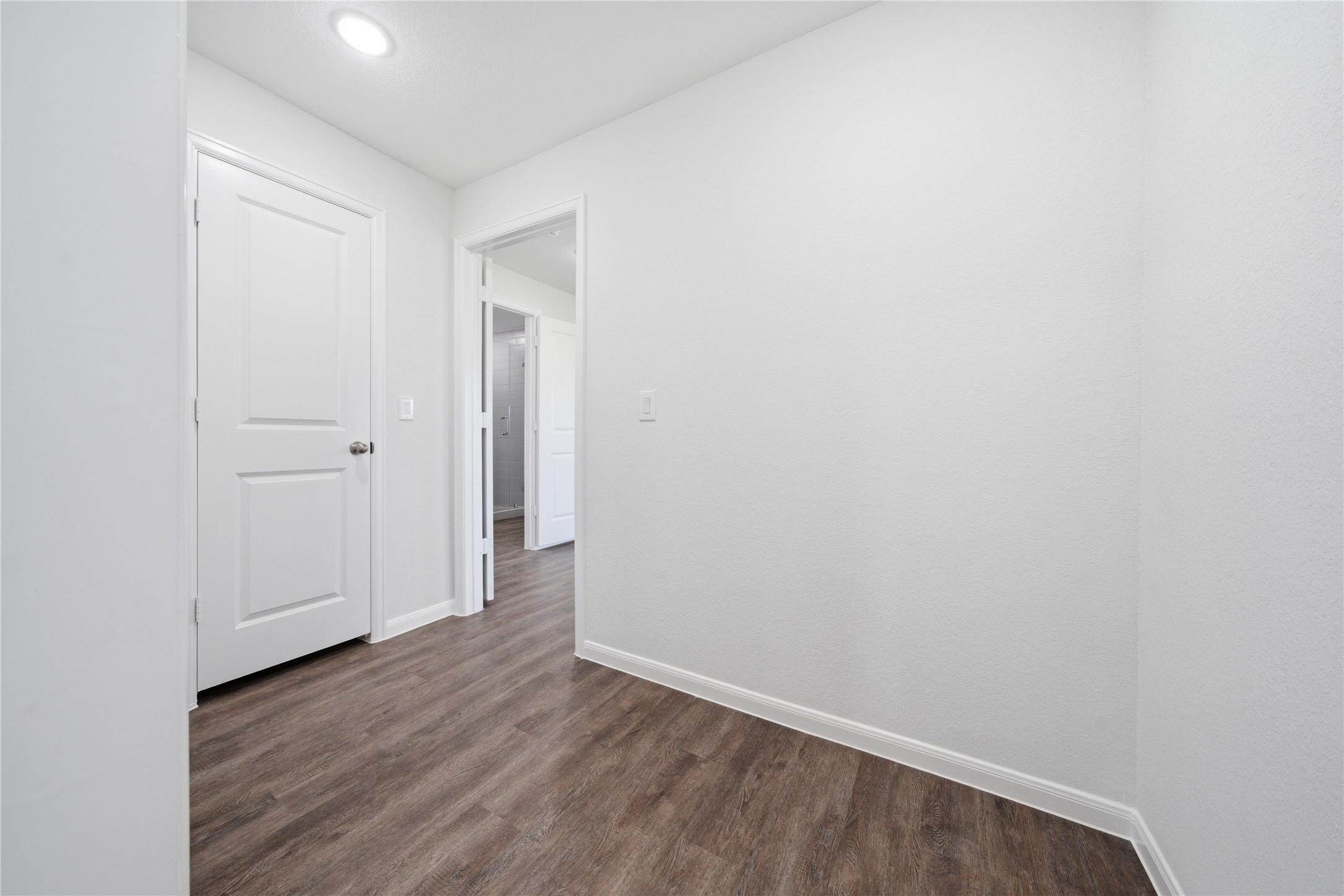 6623 County Road 4 Damon, TX 77430 - Photo 28 of 48 a view of an empty room with wooden floor