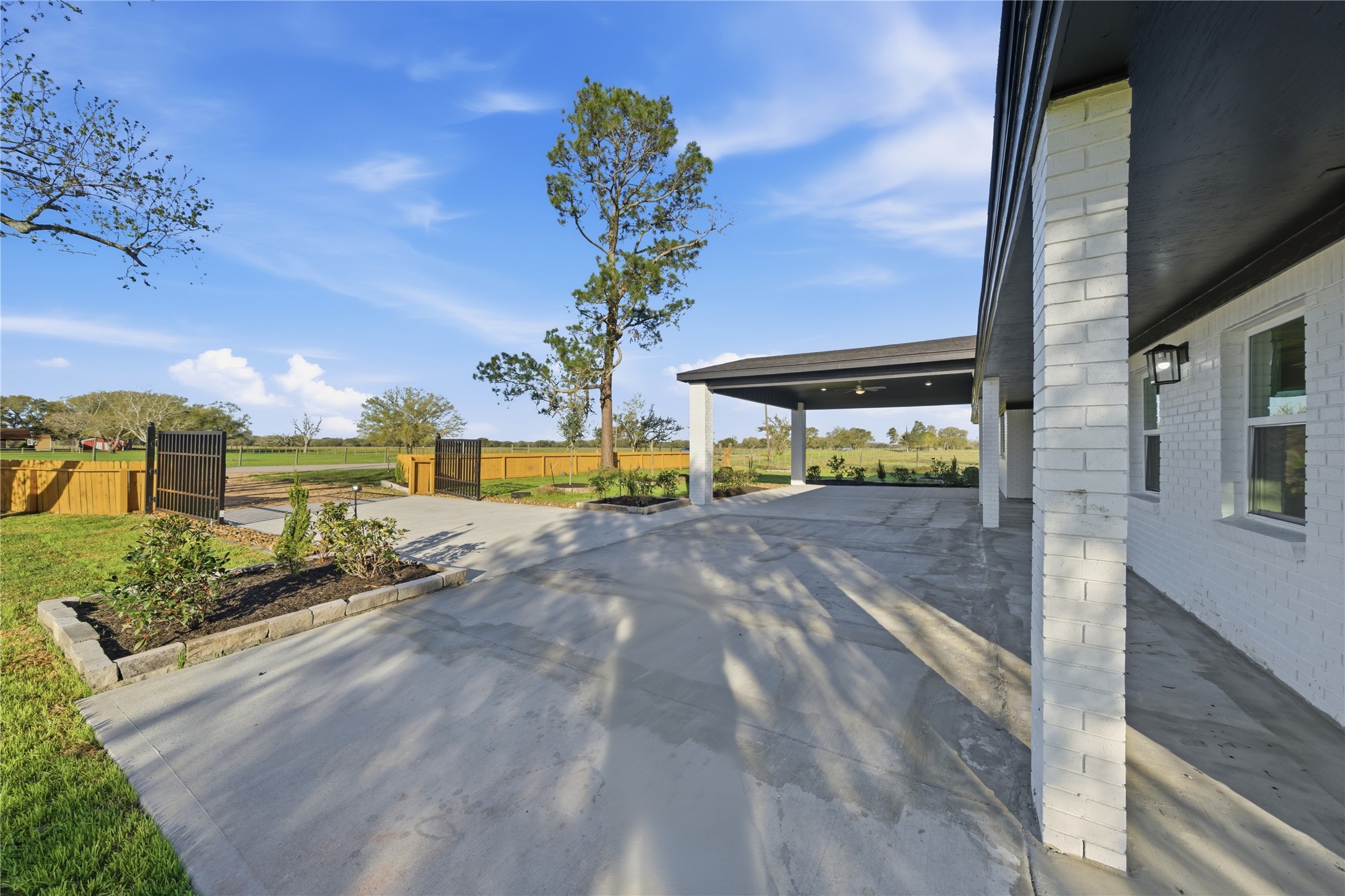 6623 County Road 4 Damon, TX 77430 - Photo 33 of 48 a view of a street with a building in the background