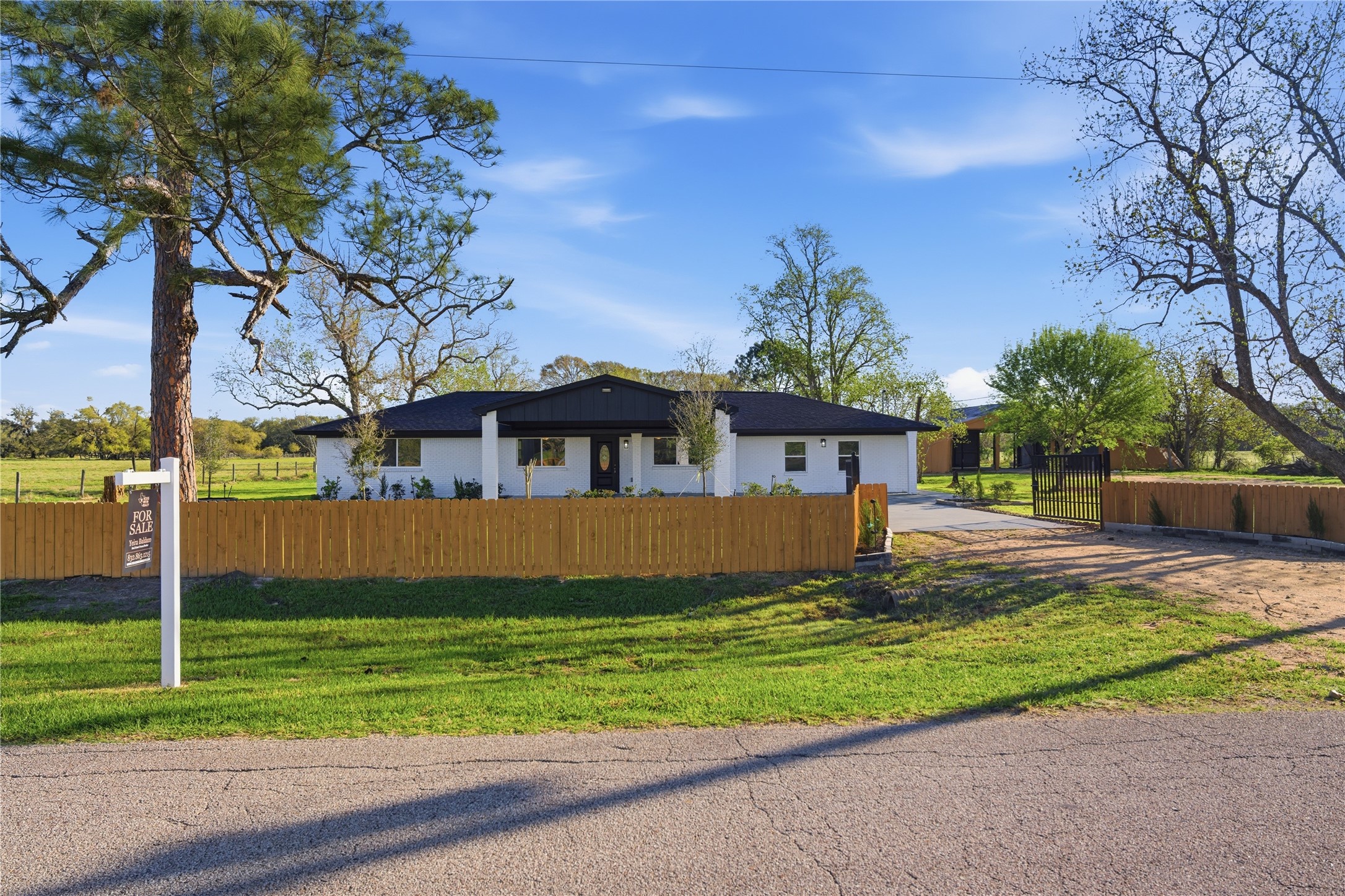 6623 County Road 4 Damon, TX 77430 - Photo 4 of 48 a view of house with a big yard