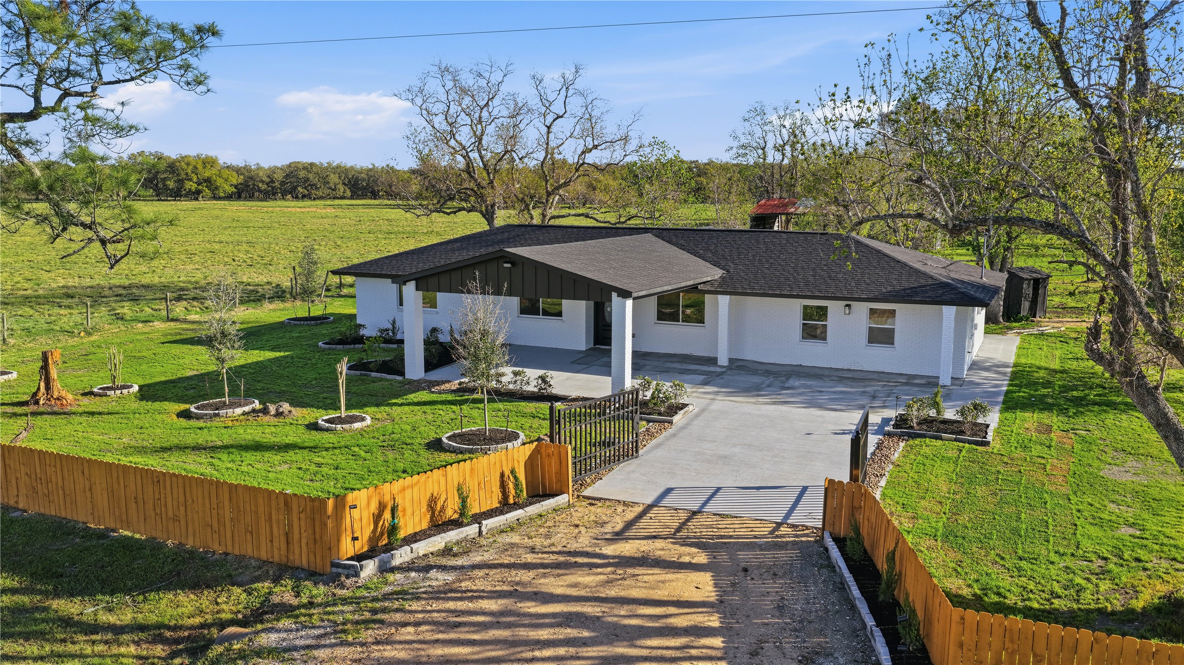 6623 County Road 4 Damon, TX 77430 - Photo 43 of 48 a view of a house with pool and a yard