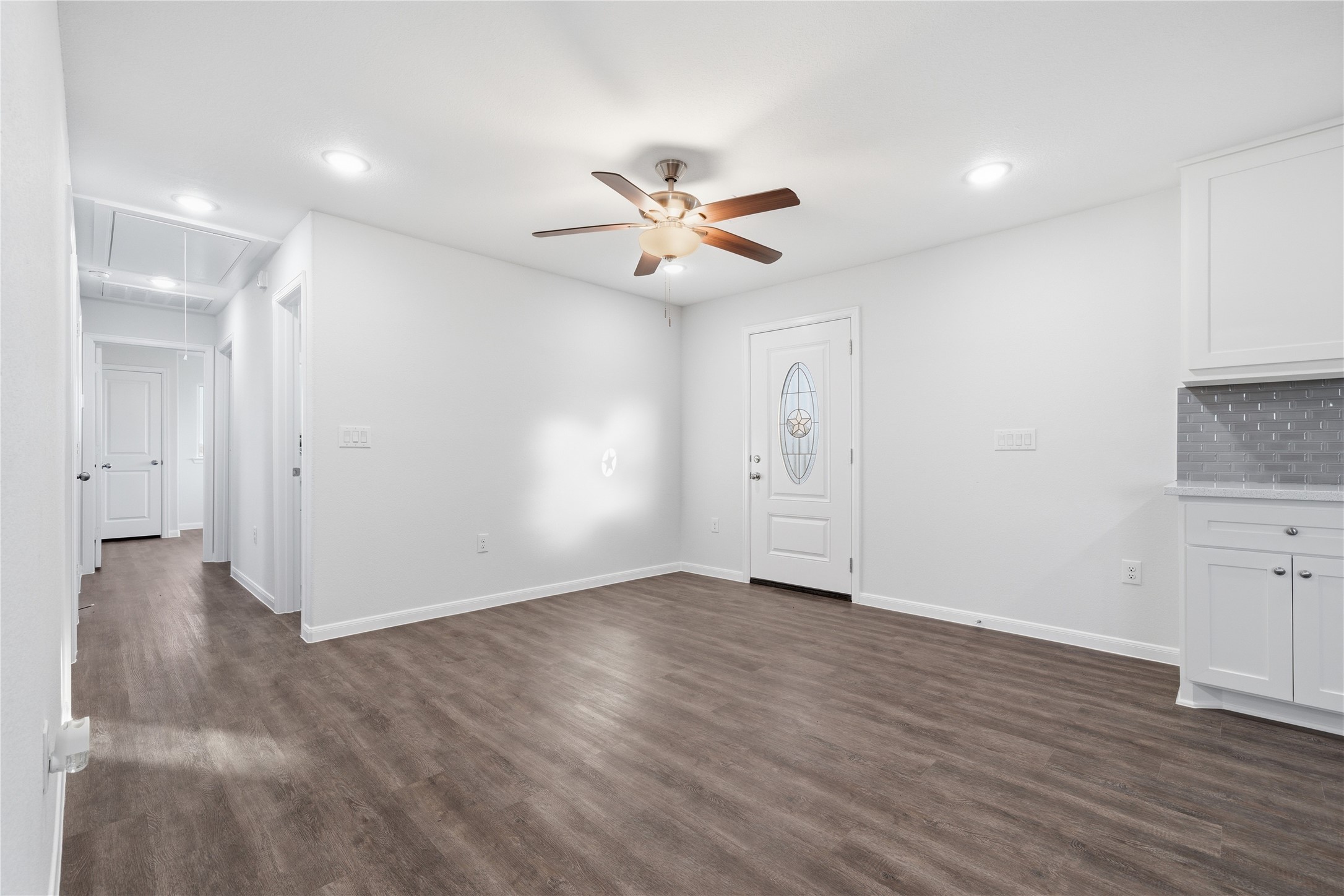6623 County Road 4 Damon, TX 77430 - Photo 10 of 48 wooden floor in an empty room with a window