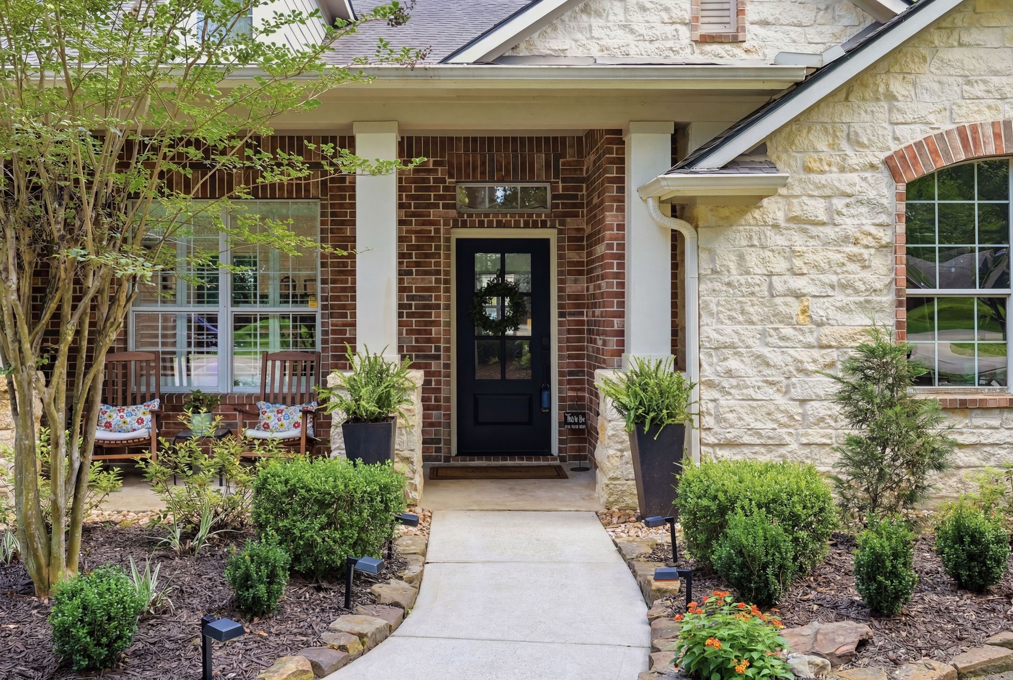 2408 Hollowbrook Lane Conroe, TX 77384 - Photo 3 of 49 The covered front porch is a lovely place to sit and have a cup of tea.