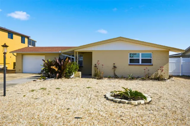 a view of a house with snow on the ground