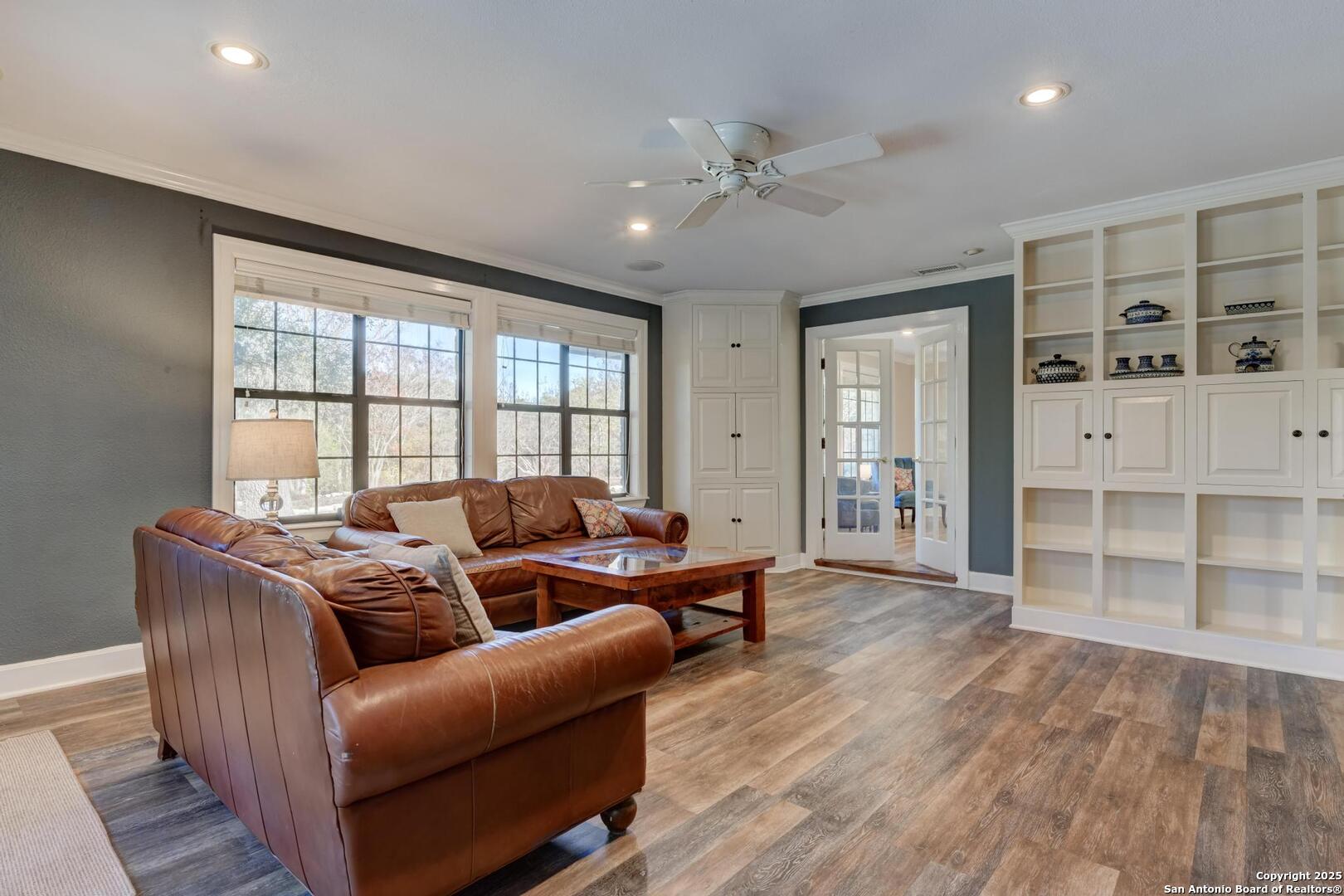 105 Shane Lane Boerne, TX 78006 - Photo 14 of 64 a living room with furniture and wooden floor